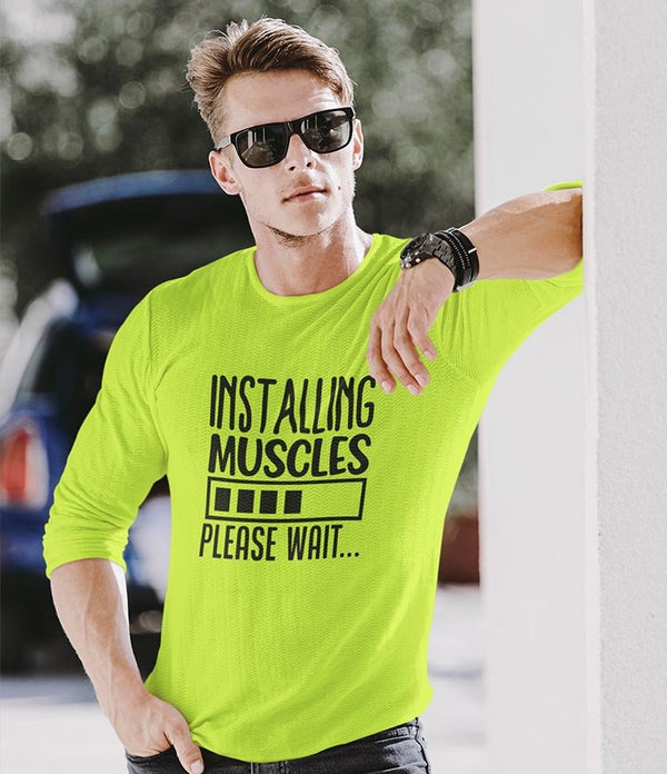 Juxar neon yellow longsleeve model wearing full sleeve cotton printed t shirt with installing muscles print