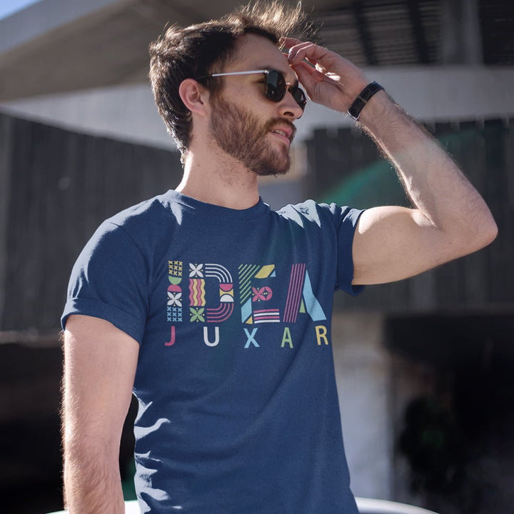 Man wearing navy blue Juxar export quality cotton t shirts India with colorful IBEX design
