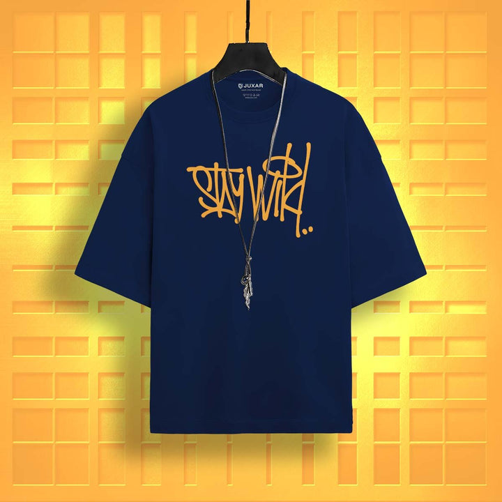 Juxar oversized graphic cotton t-shirt in navy blue with orange graffiti text and necklace accessory