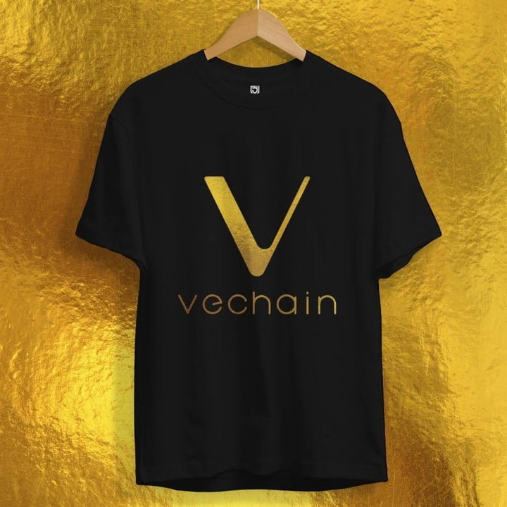 Juxar black washable cotton t shirt with gold vechain logo on front hanging on wooden hanger