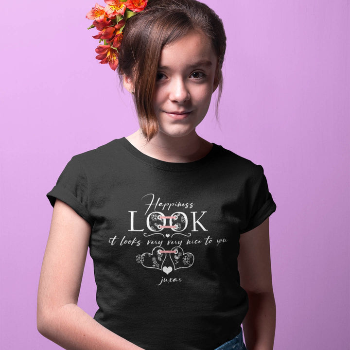 Juxar black summer t shirt for girls worn by smiling girl with floral hair accessory and white printed design