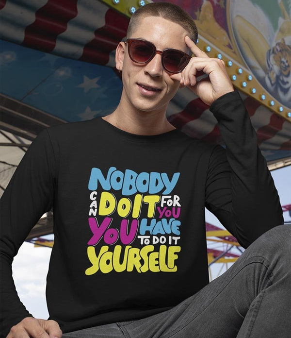 Juxar motivational long sleeve t shirt black worn by model with sunglasses showing colorful quote Nobody can do it for you