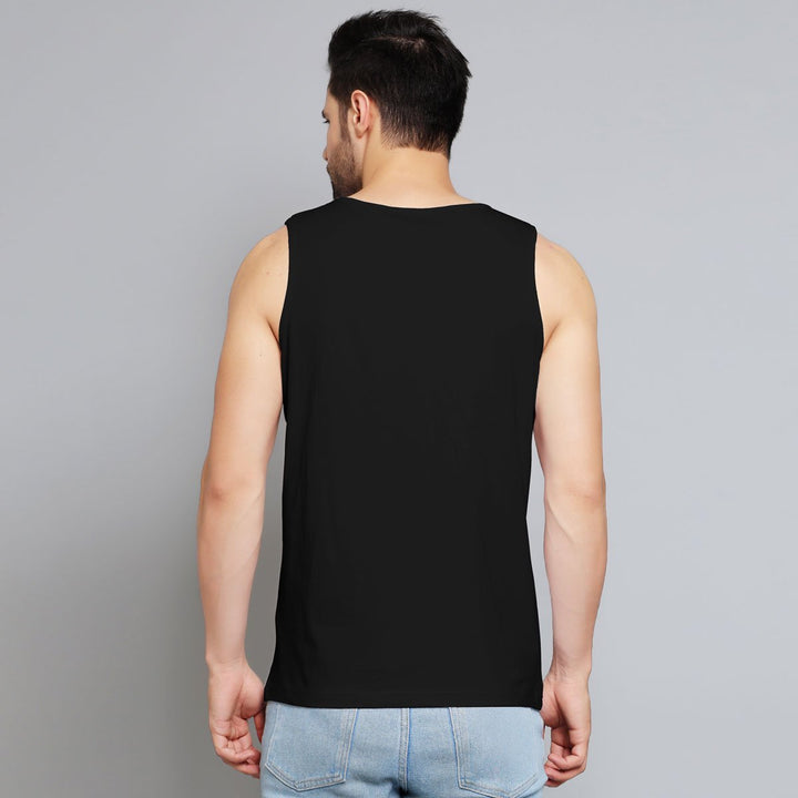 Back view of a man wearing a black sando for men by Juxar paired with light blue jeans