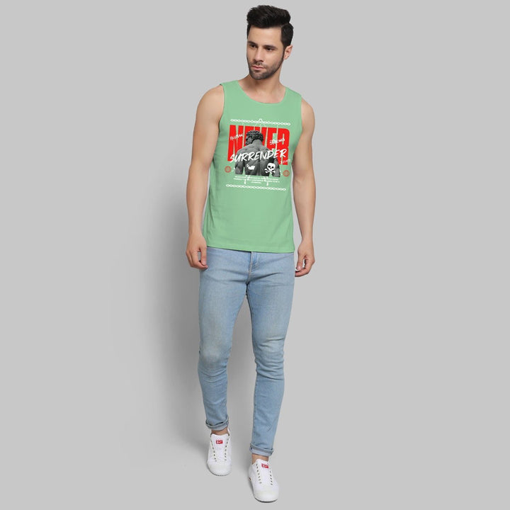 Juxar men's green artistic print sando with graphic design paired with light blue jeans and white sneakers