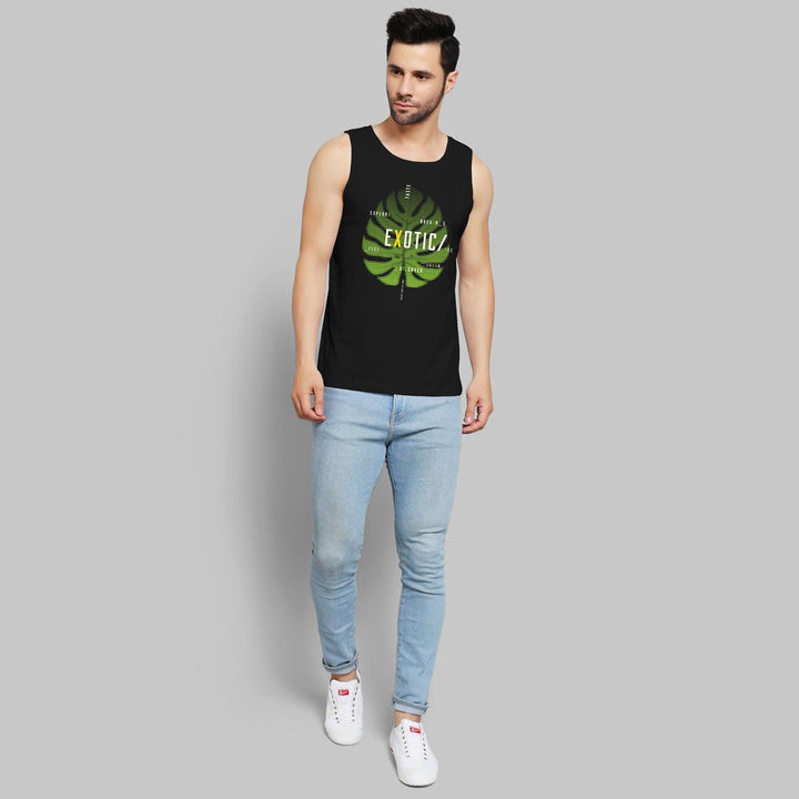 Juxar black leaf print tank for men worn by male model with light blue jeans and white sneakers