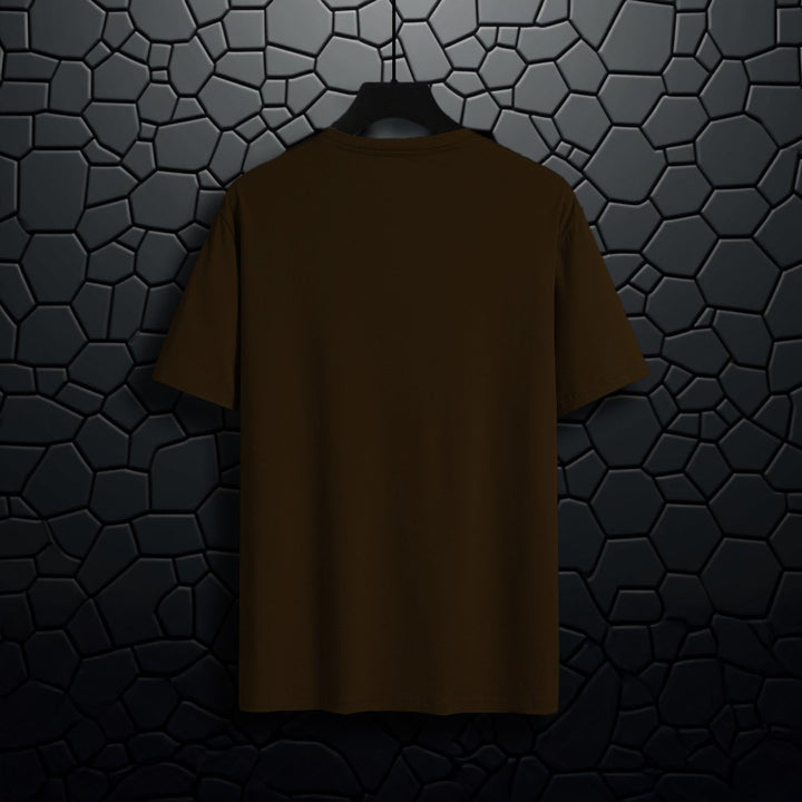 Juxar black silence t-shirt for men displayed on hanger with textured dark background