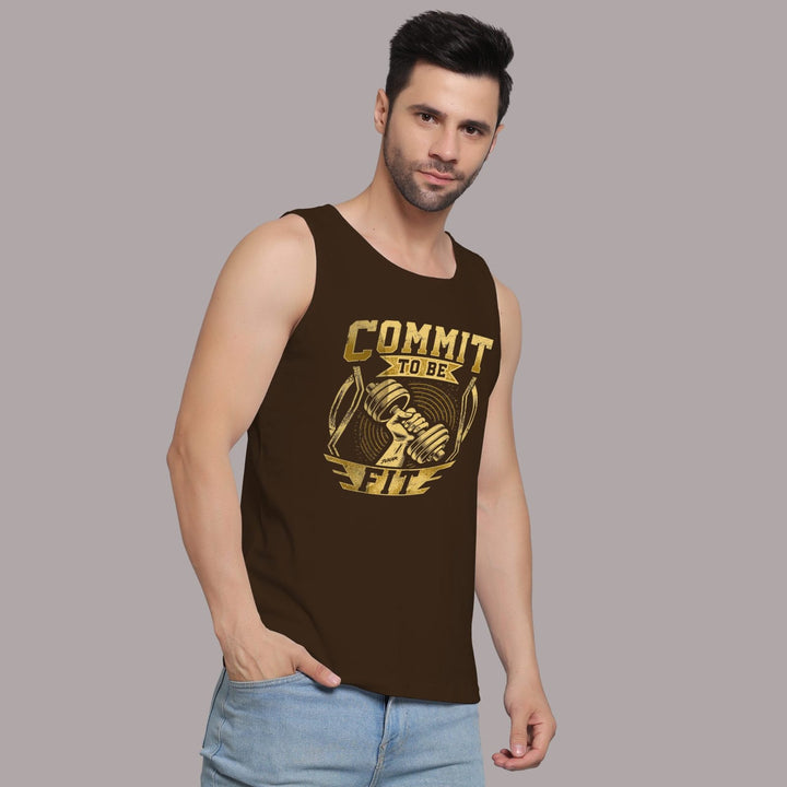 Juxar men's bodybuilding graphic sando in brown with Commit to Be Fit print worn with jeans