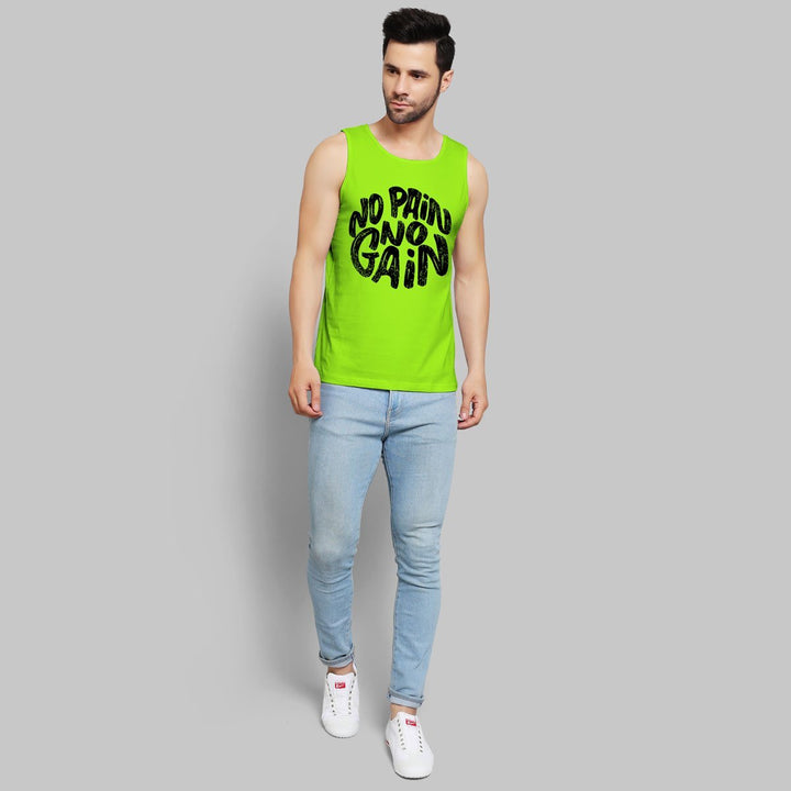 Bright green sando for men with no pain no gain print paired with light blue jeans and white sneakers