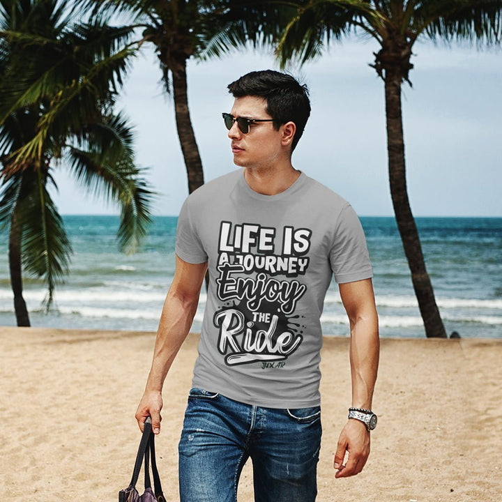 Juxar budget cotton t shirt with Life is a Journey Enjoy the Ride print worn by man at beach