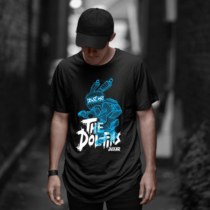 Juxar black cotton longline tee with blue robot graphic worn by male model in alley casual cotton longline t shirt