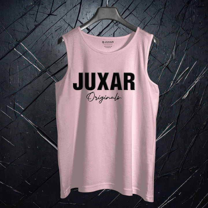 Mens casual workout sando in pink with JUXAR Originals text on front hanging on black hanger