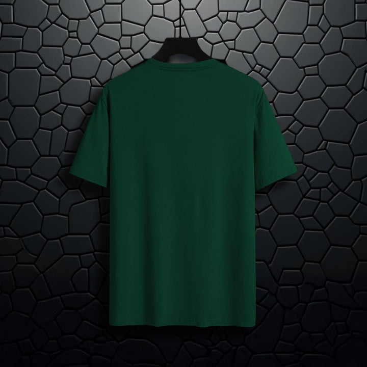 Juxar dark green cotton printed t shirt displayed on a hanger against a black textured background