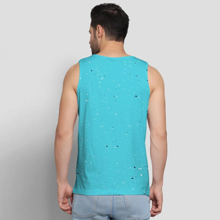 Back view of man wearing turquoise blue cotton sando for men with speckled pattern by Juxar