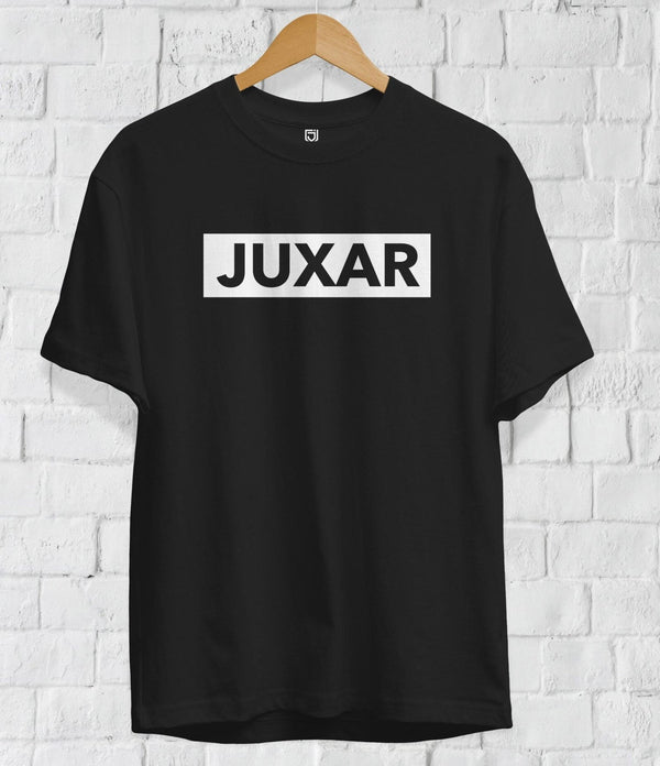 Juxar black cotton t shirt online India with white logo printed front hanging on wooden hanger