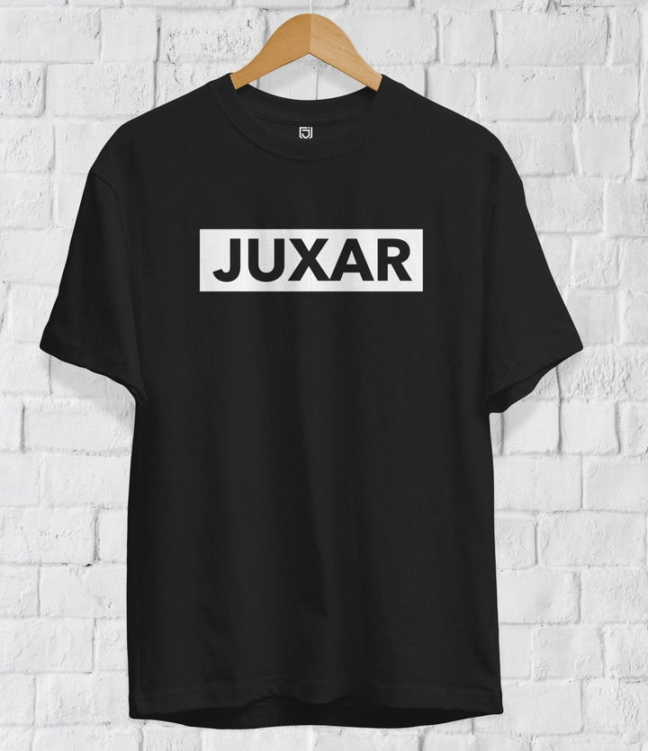 Juxar black cotton t shirt online India with white logo printed front hanging on wooden hanger