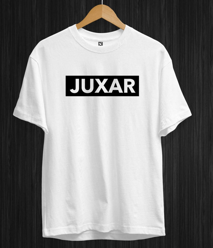 White Juxar cotton t shirt online India with black logo print on front hanging on wooden hanger