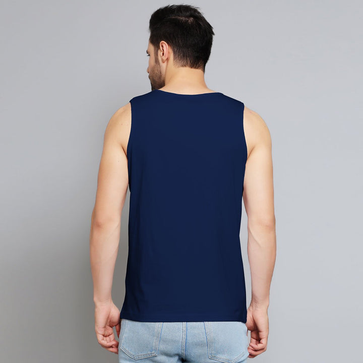 Juxar mens navy blue designer sleeveless sando shown from the back with light wash jeans
