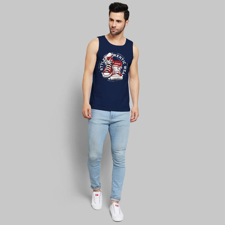 Juxar men's designer sleeveless sando in navy blue with graphic print paired with light blue jeans