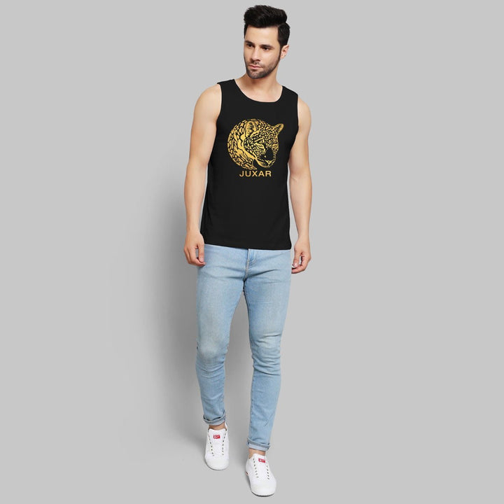 Mens Juxar black tank top with gold tiger print sando paired with light blue jeans and white sneakers