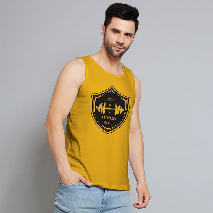 Juxar mens mustard yellow graffiti sando with fitness club logo worn with light blue jeans