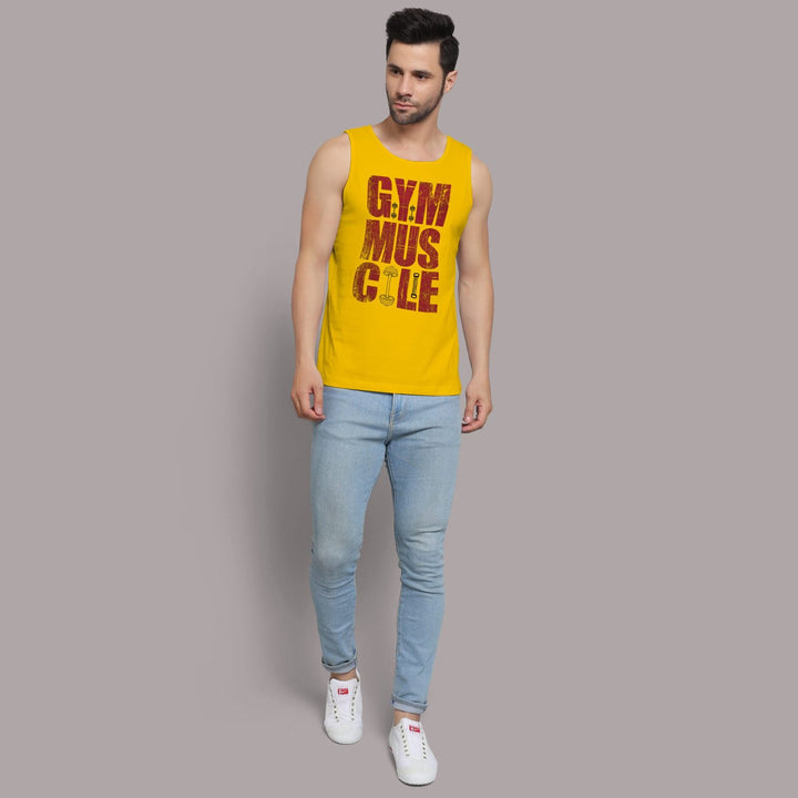 Juxar gym sando for men in yellow with gym muscle text paired with light blue jeans