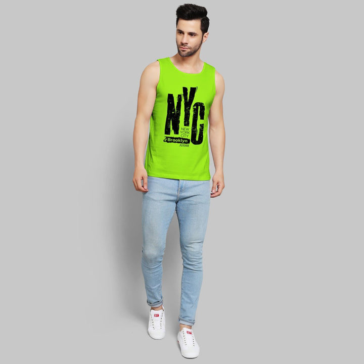 Juxar bright green gym wear sando for adult men with NYG Brooklyn print, paired with light blue jeans
