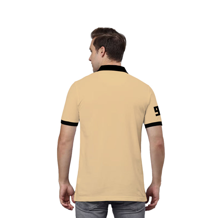 Juxar beige half sleeve cotton polo t shirt back view on male model with black collar and sleeve trim and number 9 on sleeve