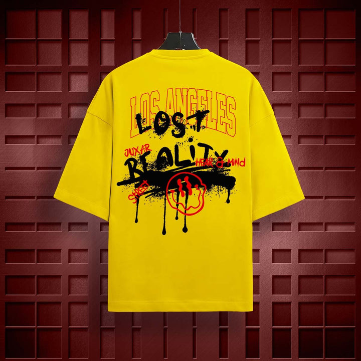 Juxar lost reality oversized t-shirt in bright yellow with bold graphic text and design on back