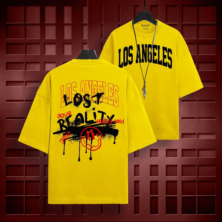 Juxar lost reality oversized t-shirt in yellow with Los Angeles text and graphic print on back