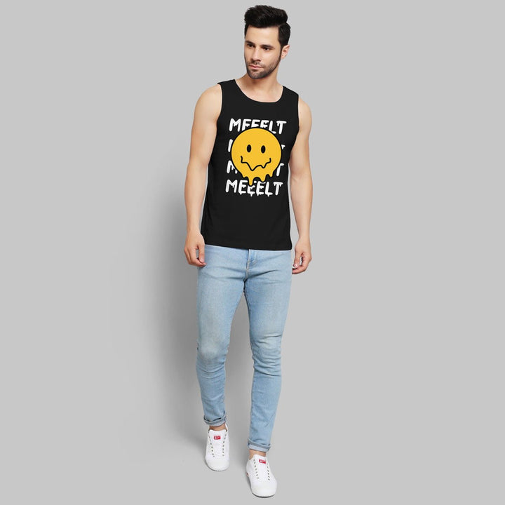 Juxar mens black sleeveless melting smiley face shirt paired with light blue jeans and white sneakers