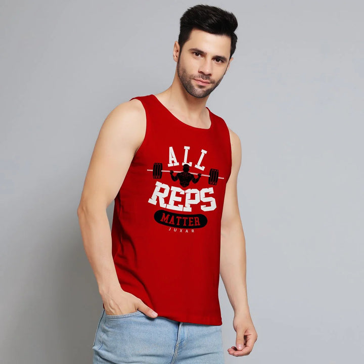 Juxar mens sleeveless lifting shirt in red with All Reps Matter graphic worn by male model