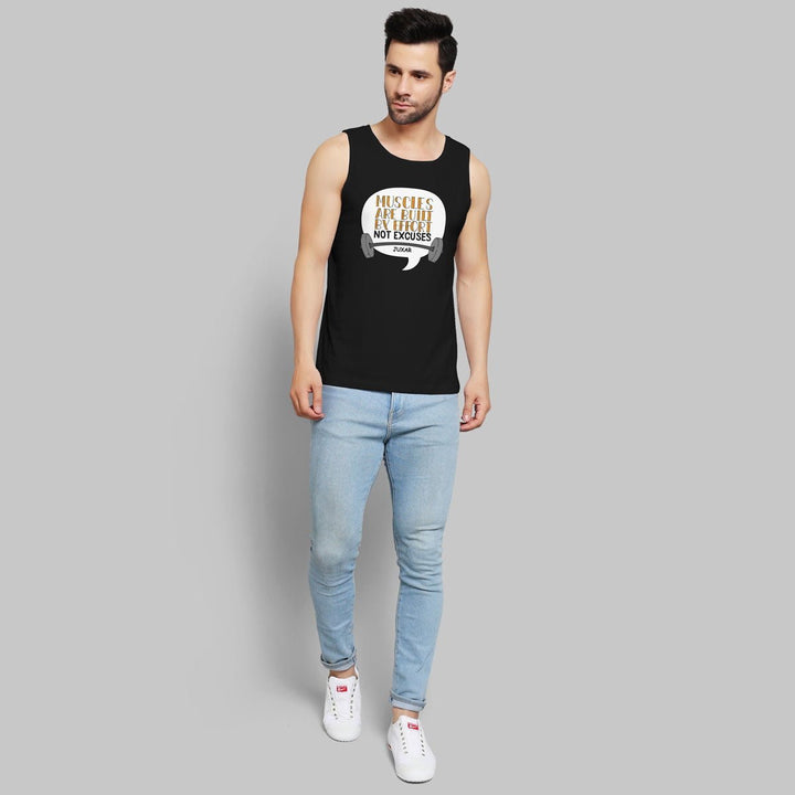 Juxar mens black muscles are built by effort tank paired with light blue jeans and white sneakers