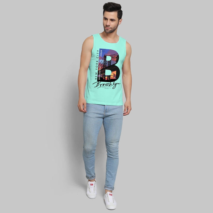 Juxar mens New York City summer sando in mint green with Brooklyn graphic and light blue jeans