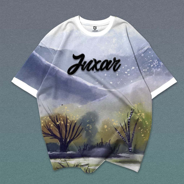 Mens oversized graphic tee with Juxar script and watercolor mountain landscape print in muted tones
