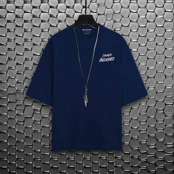 Juxar navy oversized t-shirt with short sleeves and graphic text showing pastel cotton oversized t-shirt style