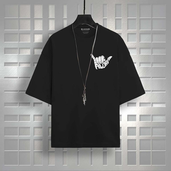 Juxar black oversized plus size cotton t-shirt with white Aloha hand graphic and necklace