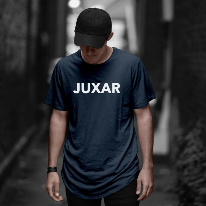 Juxar navy longline tee on male model with cap in alleyway premium cotton longline t shirt