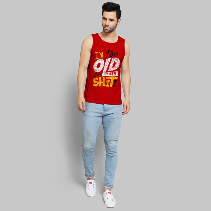 Juxar mens retro slogan muscle sando in red with graphic text paired with light blue jeans