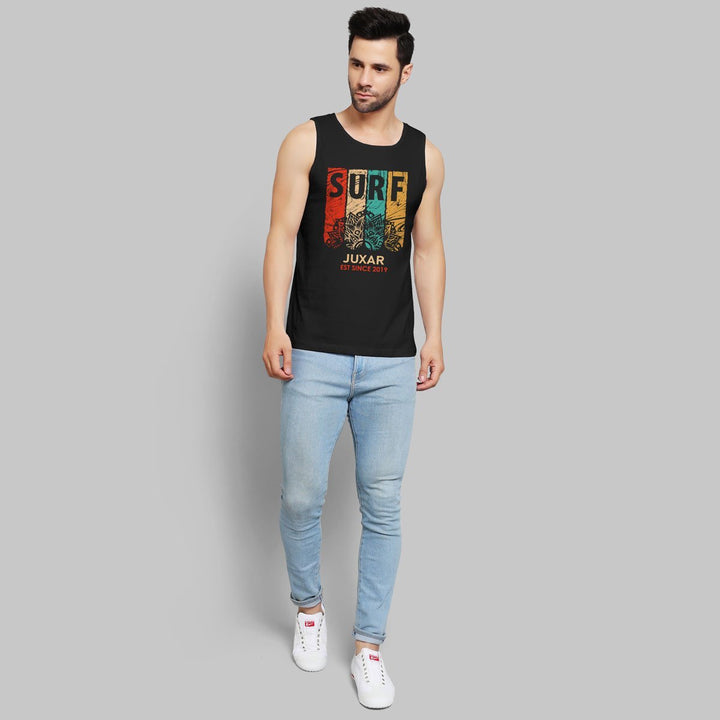 Juxar black sleeveless sando for daily wear with colorful surf graphic worn by man in jeans