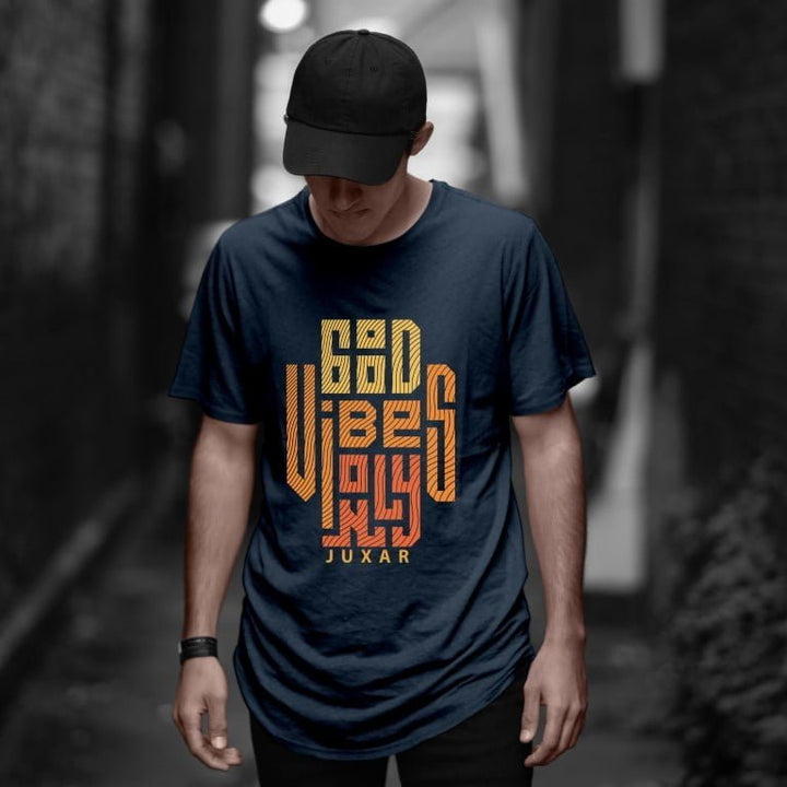 Juxar navy cotton slim fit longline tee with orange geometric Good Vibes graphic on male model