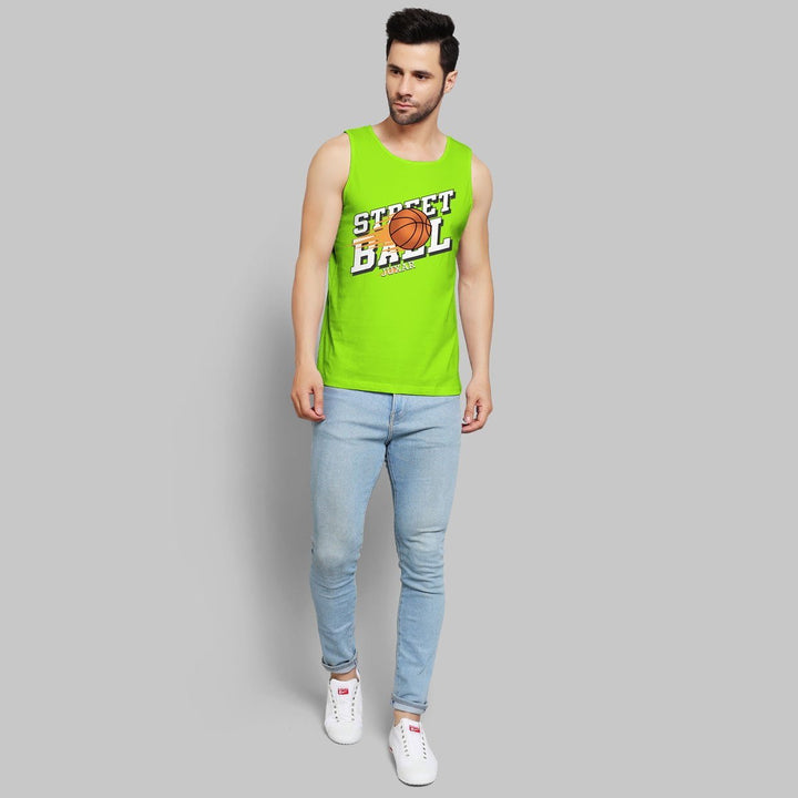 Juxar trendy sando for men in bright green with street ball graphic paired with light blue jeans