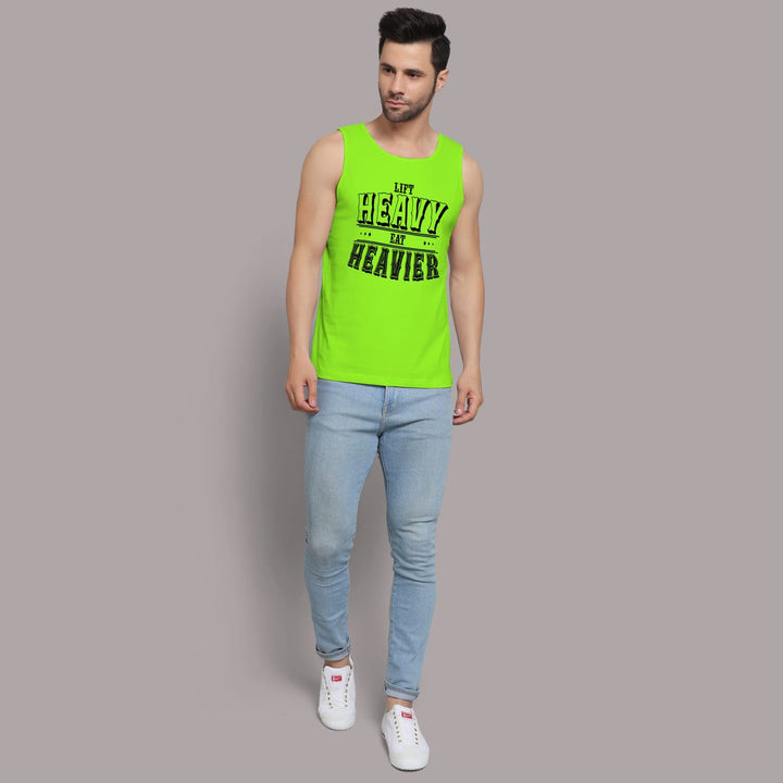 Juxar bright green vest mens sandos with heavy lift print paired with light blue jeans and white sneakers
