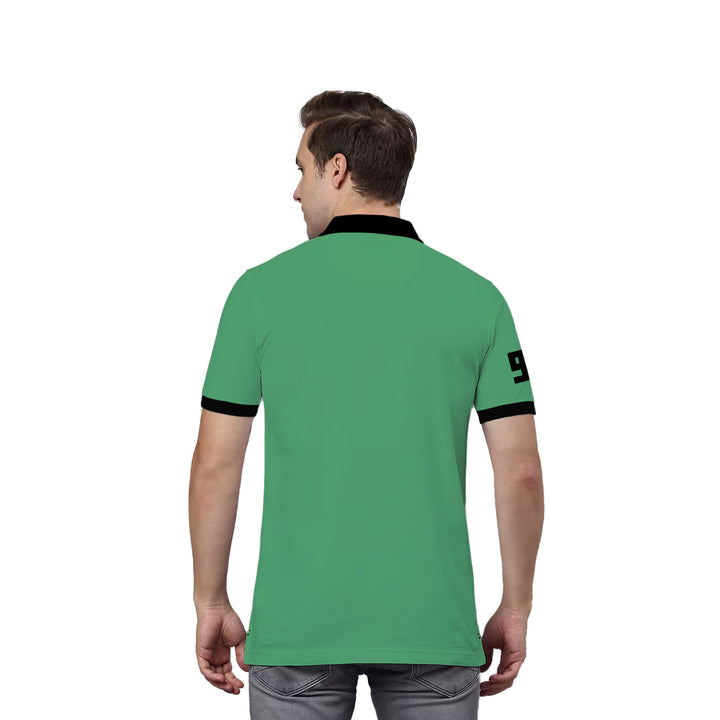 Juxar green polo cotton tee back view on male model with black collar and sleeve trim and printed 9