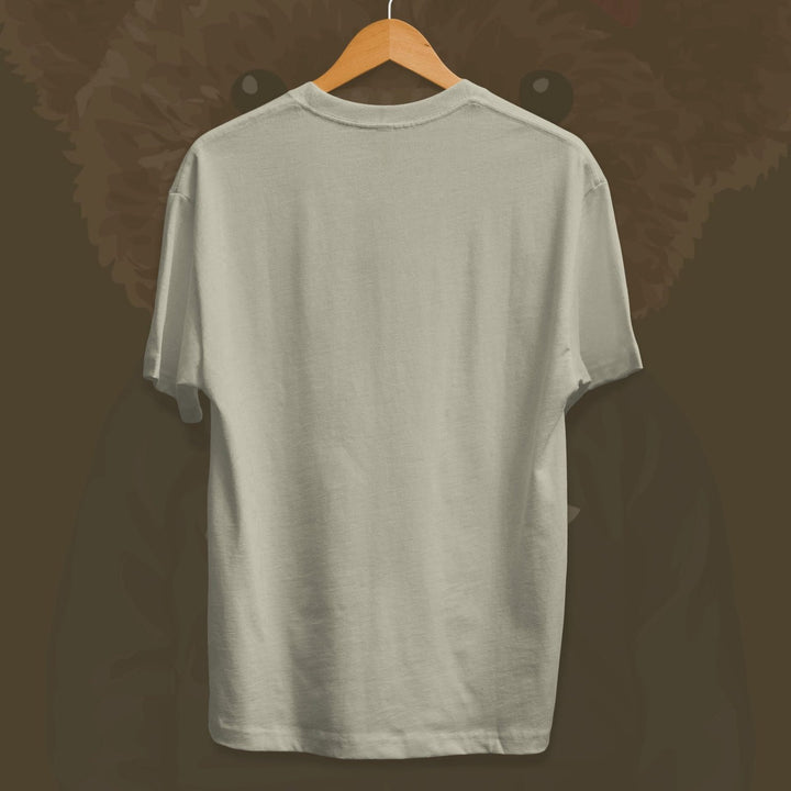 Juxar plain beige lightweight cotton t shirt for men hanging on wooden hanger against dark background