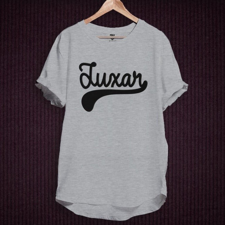 Juxar gray cotton longline t shirt with black script logo on hanger showing curved hem and rolled sleeves