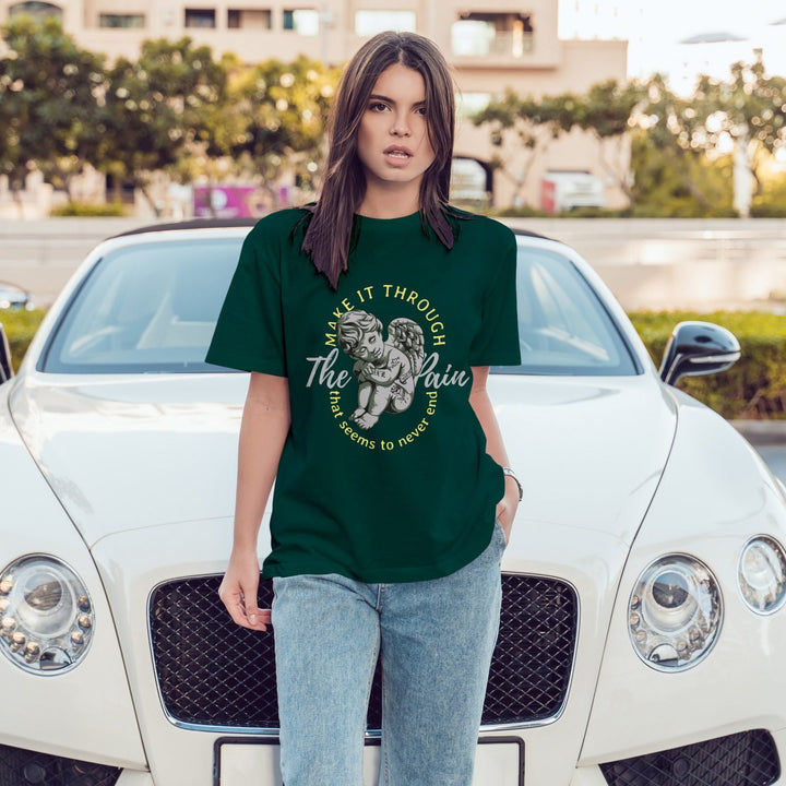 Juxar designer boyfriend t shirt dark green graphic tee worn by woman standing in front of white luxury car