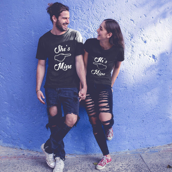 Juxar long distance couple t shirt set black matching tees Shes Mine Hes Mine holding hands against blue wall