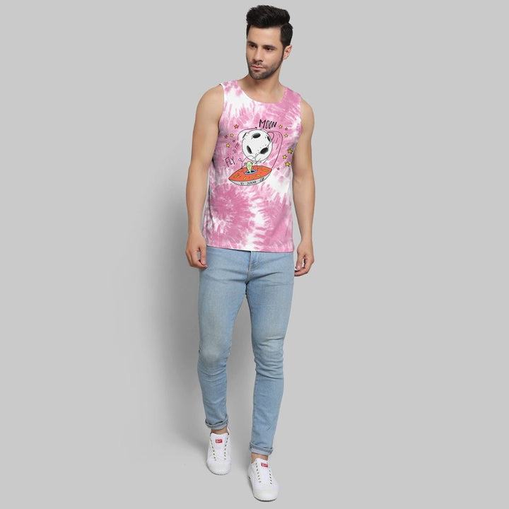 Juxar men wearing a pink tie-dye men’s printed vest with a playful graphic and light blue jeans