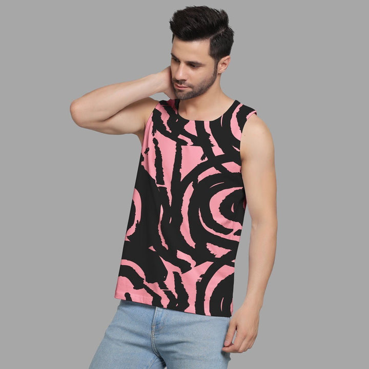 Juxar men sleeveless t-shirt with black and pink abstract pattern worn with blue jeans