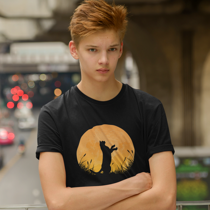 Juxar boys black cat graphic tee showing black tee with silhouetted cat in front of orange moon on teen model
